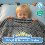 Kind onder Ella minky verzwaringsdeken met hoge klantbeoordeling en OEKO-TEX certificering